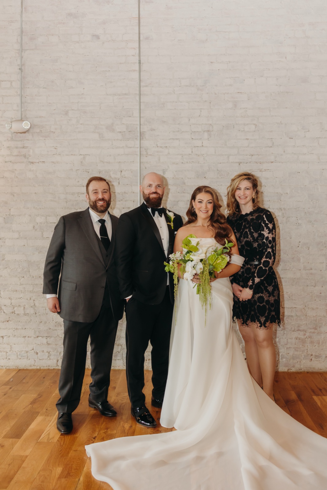A couple with family, dressed for the day